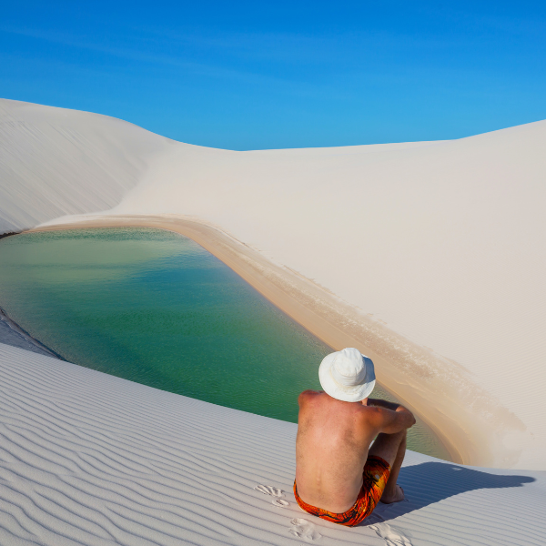 Turquoise rain fed lagoons between white dunes at Lençóis Maranhenses in the June to September window